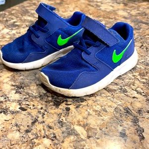 Blue and green Nike shoes